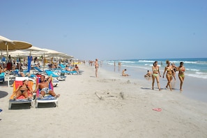 Private beach, sun-loungers, beach umbrellas, beach towels