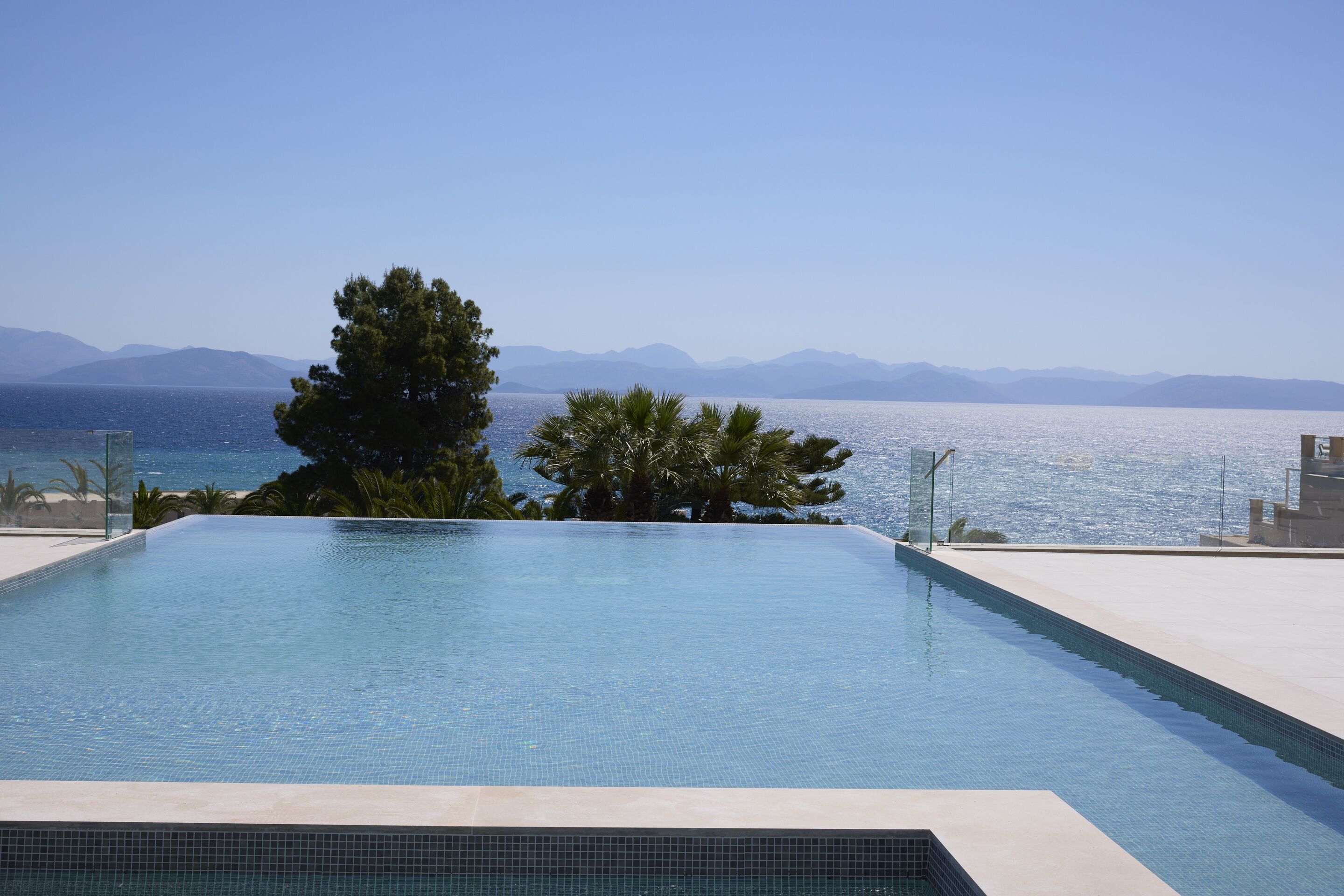 seasonal outdoor pool, open 10:00 am to 6:00 pm, pool umbrellas