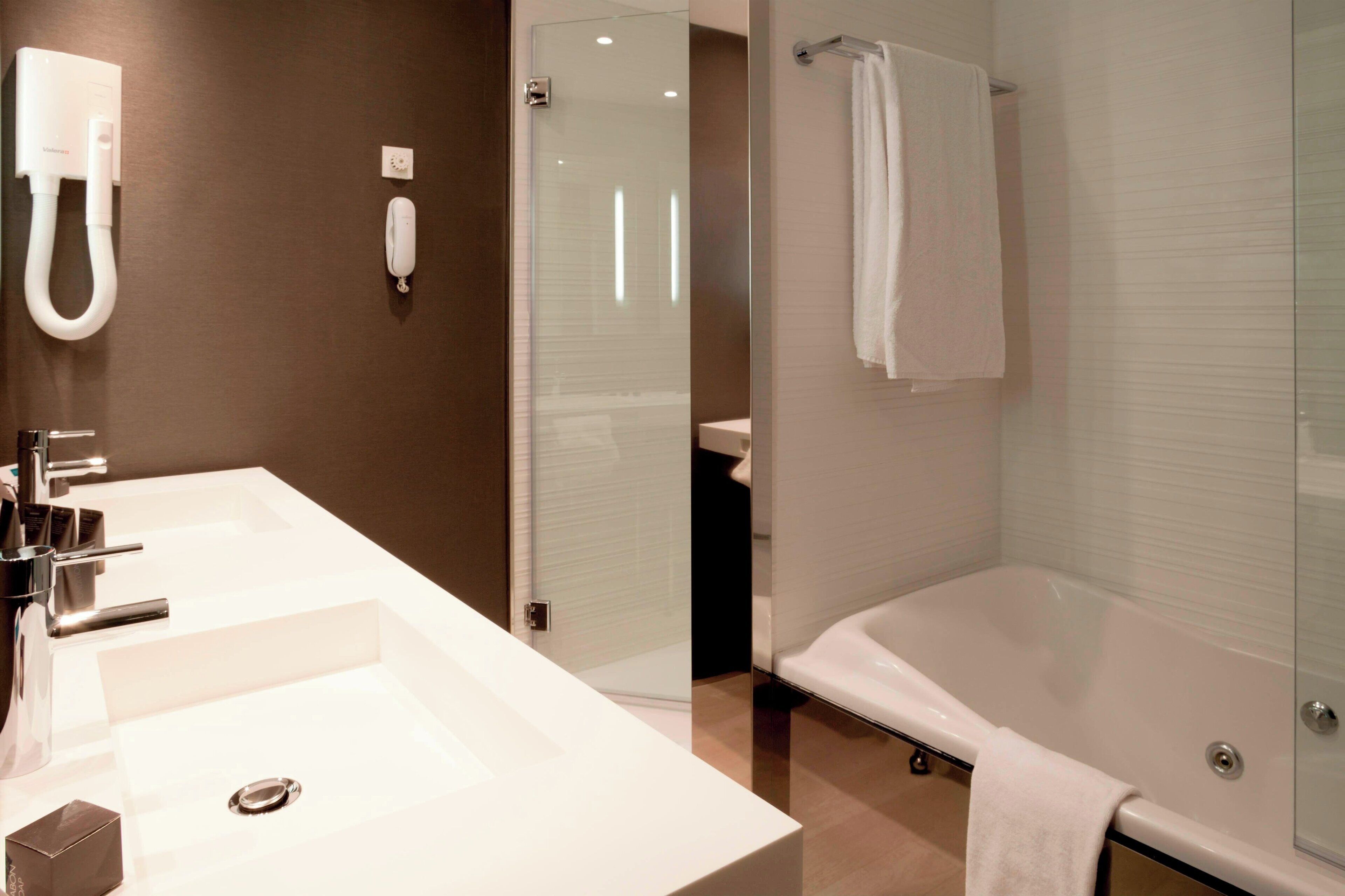 eco-friendly toiletries, hair dryer, bidet, towels