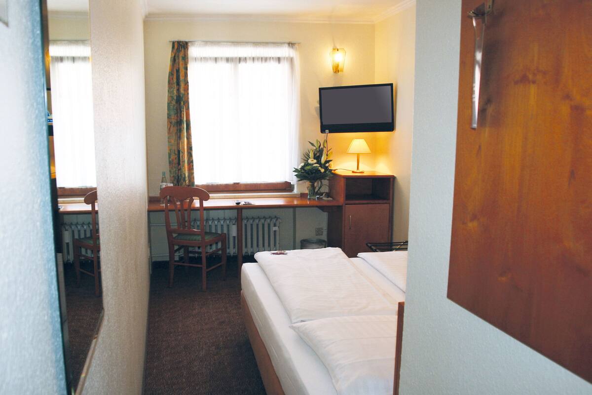 Hypoallergeen beddengoed, een kluis op de kamer, een bureau