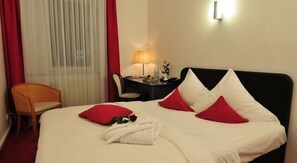 Hypo-allergenic bedding, desk, blackout curtains, iron/ironing board