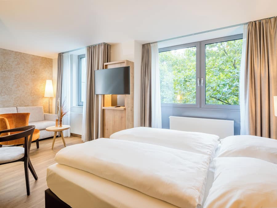 Hypo-allergenic bedding, desk, blackout drapes, soundproofing