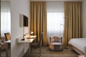 Habitación Business individual | Escritorio, espacio para trabajar con un portátil, cortinas opacas