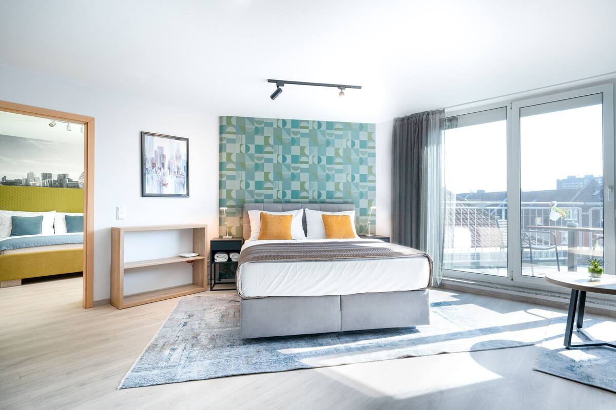 Apartment, 2 Bedrooms, Patio | Select Comfort beds, minibar, in-room safe, desk