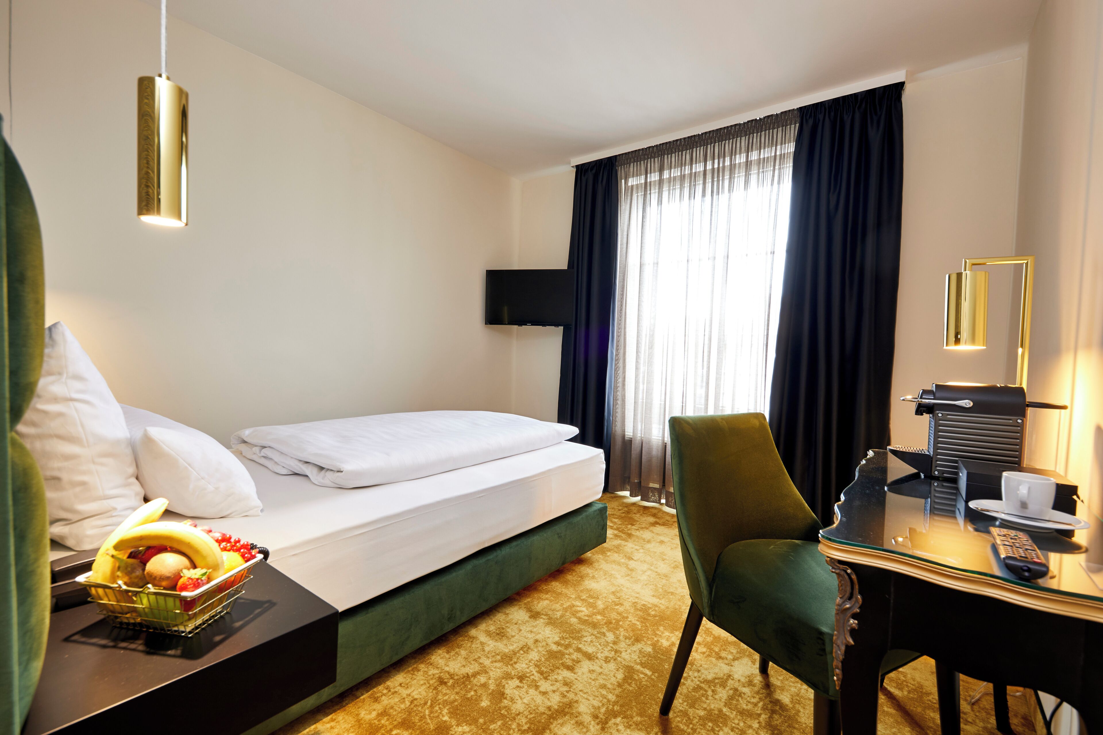 Roba de llit hipoal·lergògena, minibar i caixa forta a l&#x27;habitació 