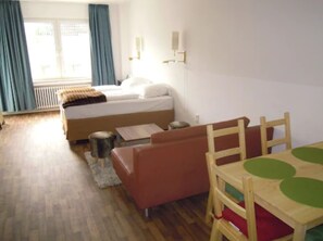 Quadruple Room (400 EUR deposit per stay) | Hypo-allergenic bedding, in-room safe, desk, blackout drapes