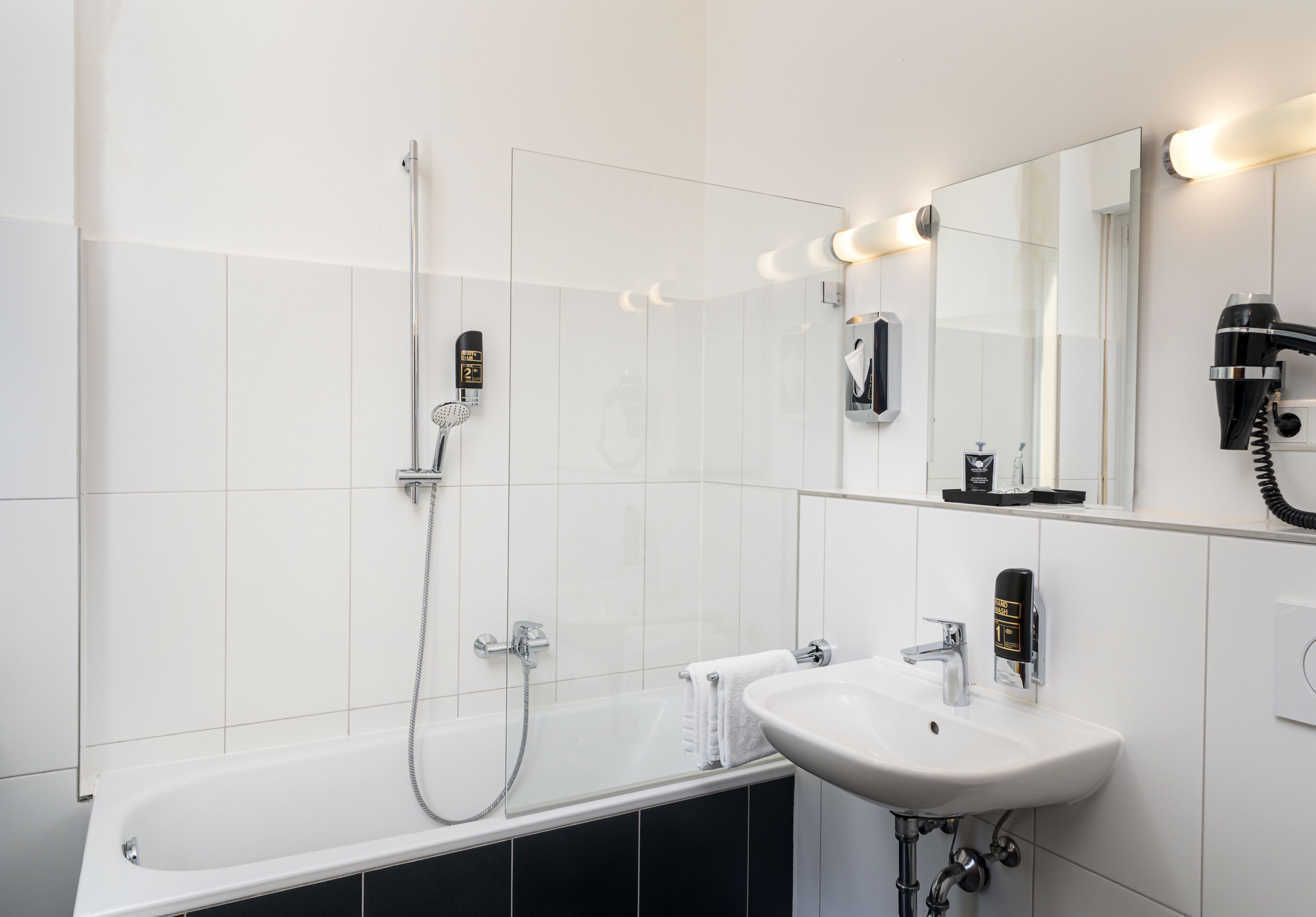 standard double room | bathroom | shower, designer toiletries, hair dryer, slippers