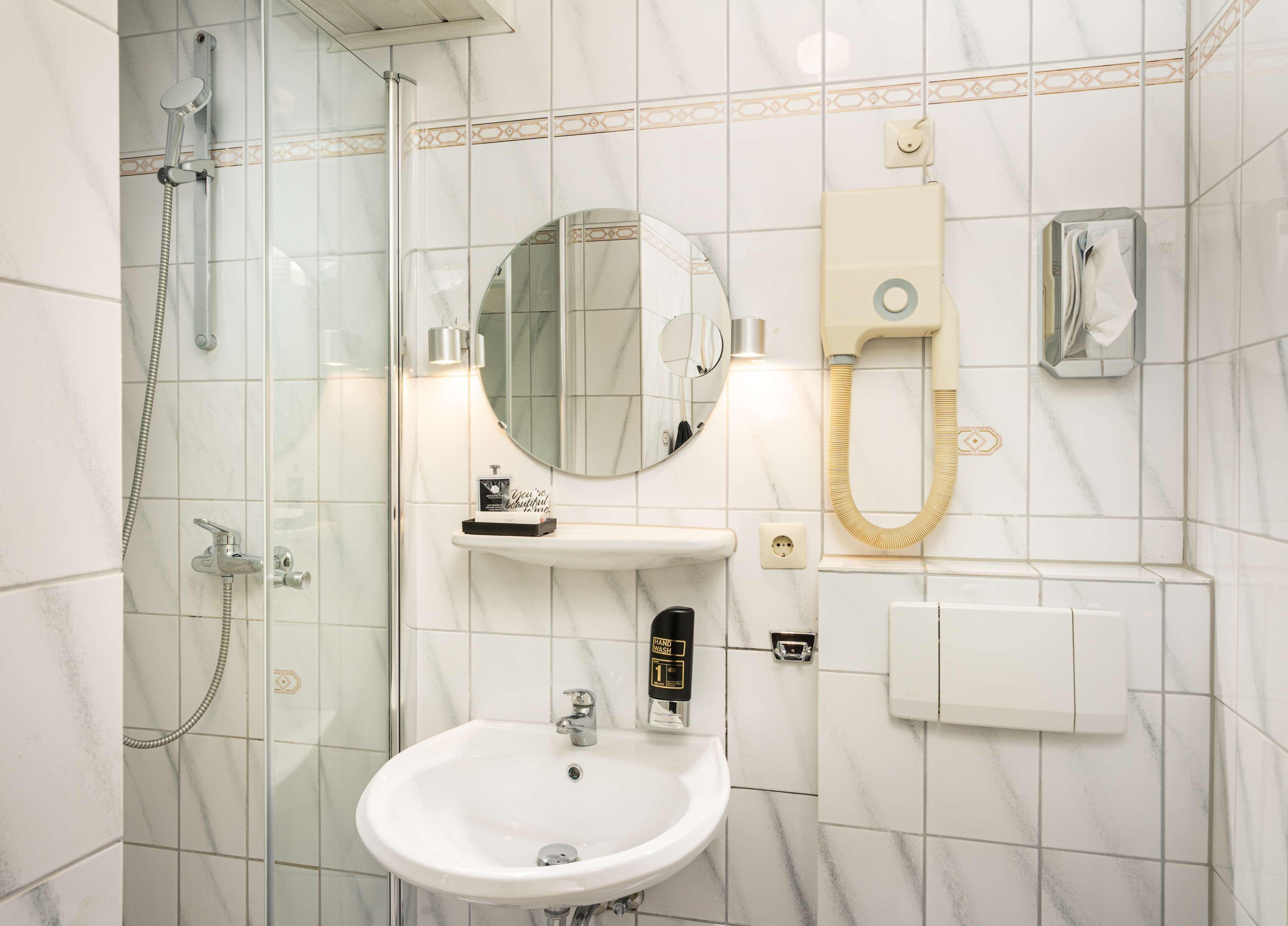 superior double room | bathroom | shower, designer toiletries, hair dryer, slippers