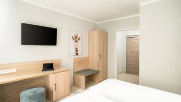 Standard Double Room | Minibar, in-room safe, desk, blackout drapes