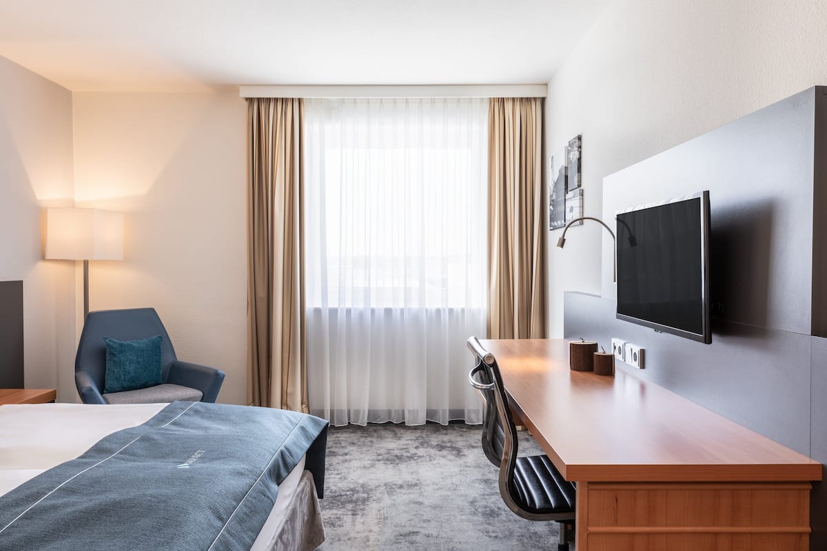 Hypoallergeen beddengoed, een kluis op de kamer, een bureau