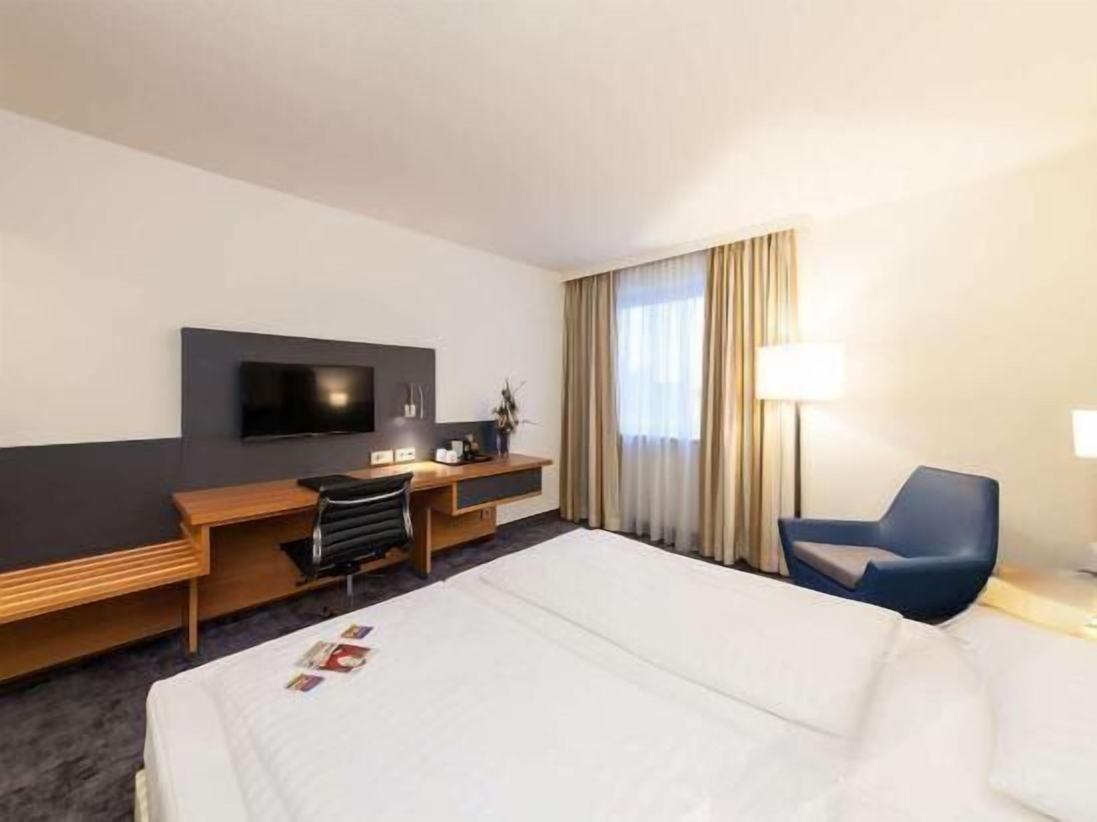 Hypoallergeen beddengoed, een kluis op de kamer, een bureau