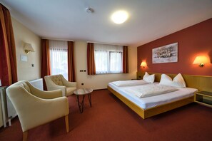 Tweepersoonskamer | Luxe beddengoed, een minibar, een kluis op de kamer