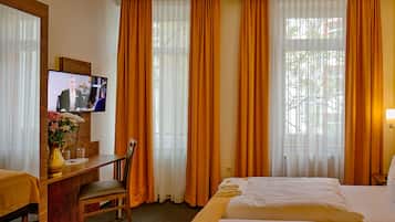 Desk, laptop workspace, blackout curtains, iron/ironing board