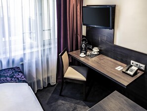 Quarto standard, 1 cama de solteiro | Frigobar, cofres nos quartos, escrivaninha, quartos à prova de som