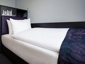 Habitación estándar, 1 cama individual | Minibar, caja de seguridad en la habitación y escritorio 