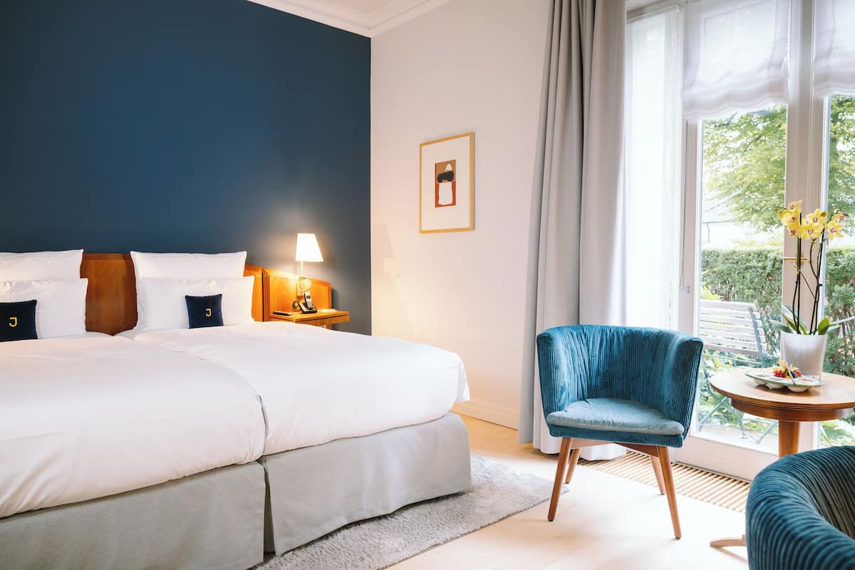 1 dormitorio y ropa de cama de alta calidad