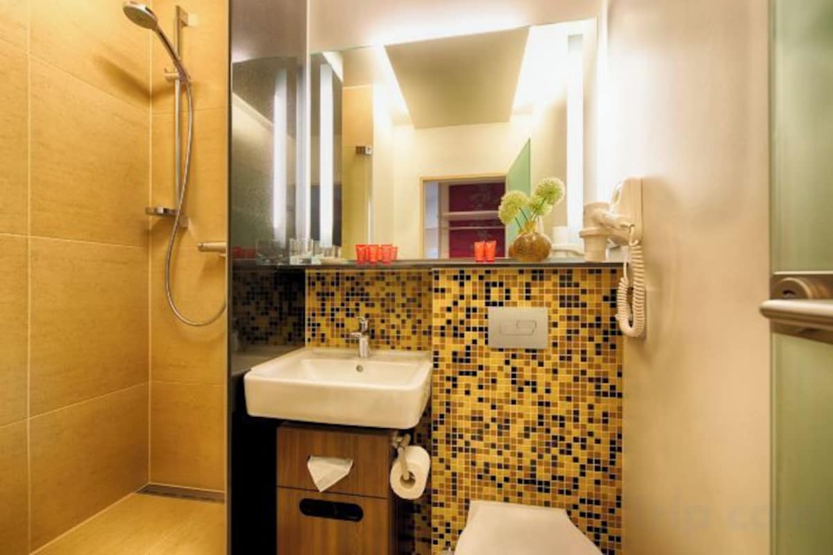 Shower, free toiletries, hair dryer, towels