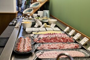 Daily buffet breakfast (EUR 14 per person)