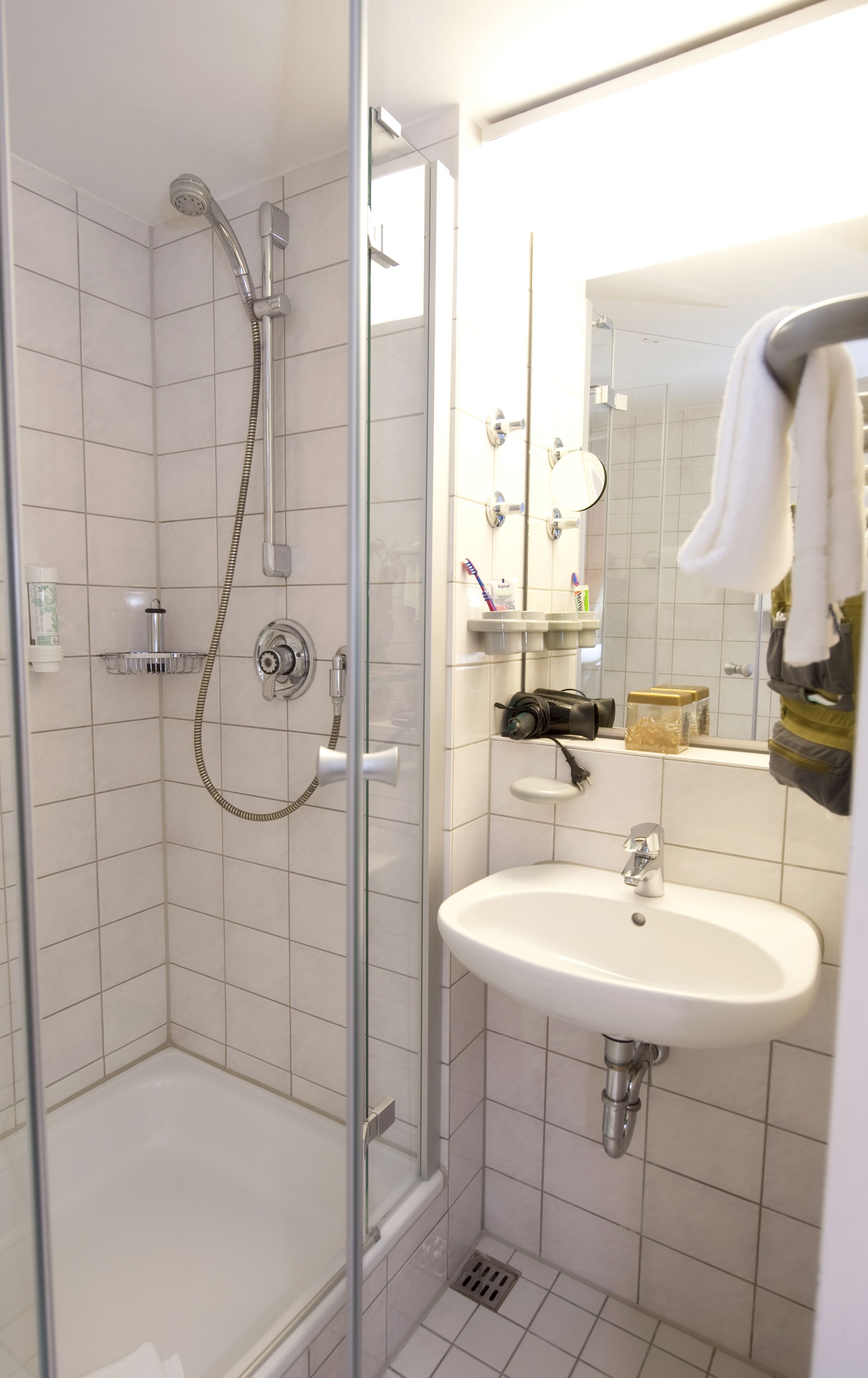 shower, free toiletries, hair dryer, towels