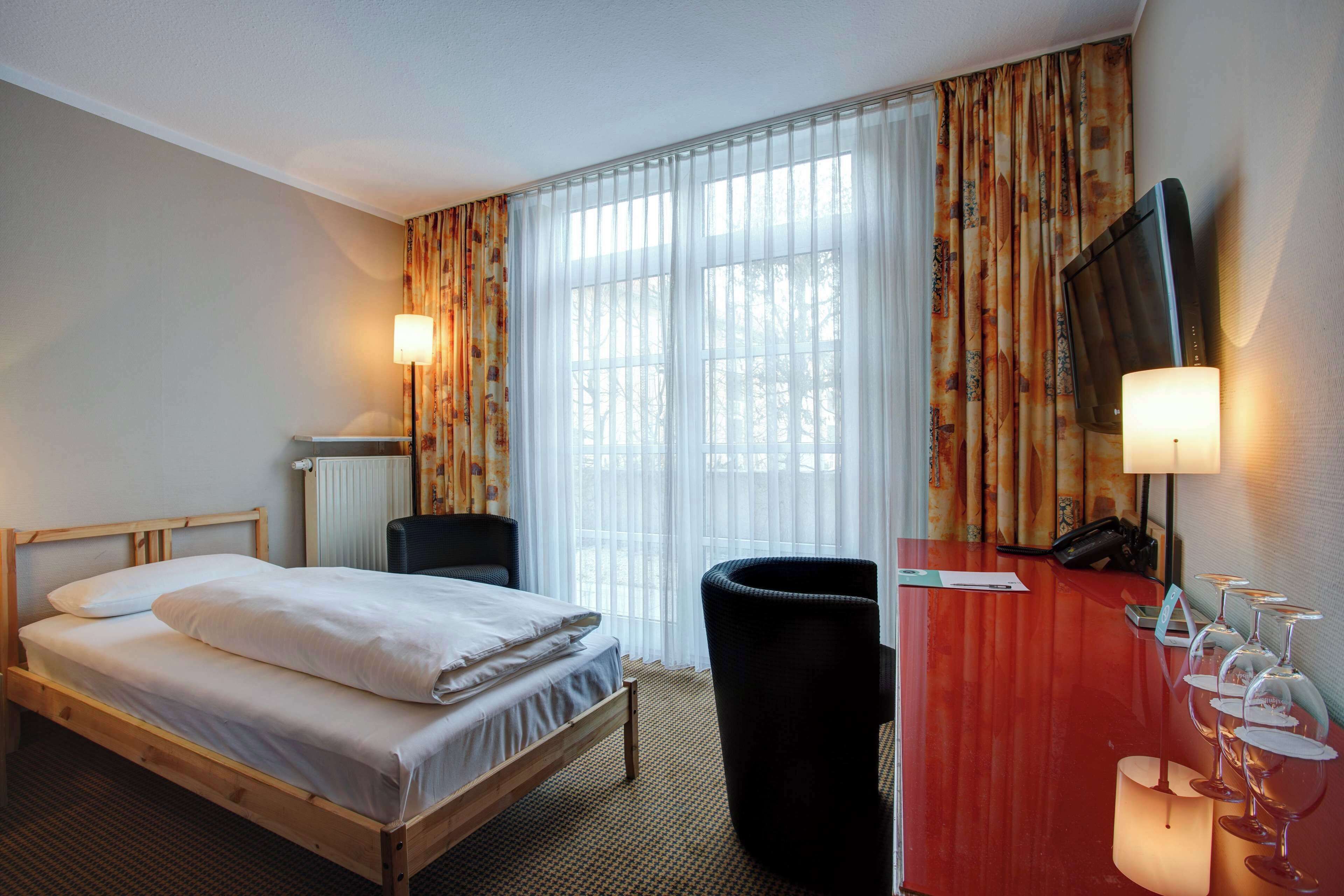 hypo-allergenic bedding, pillow-top beds, individually furnished, desk