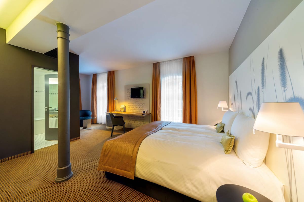 business double room | in-room safe, desk, laptop workspace, blackout curtains