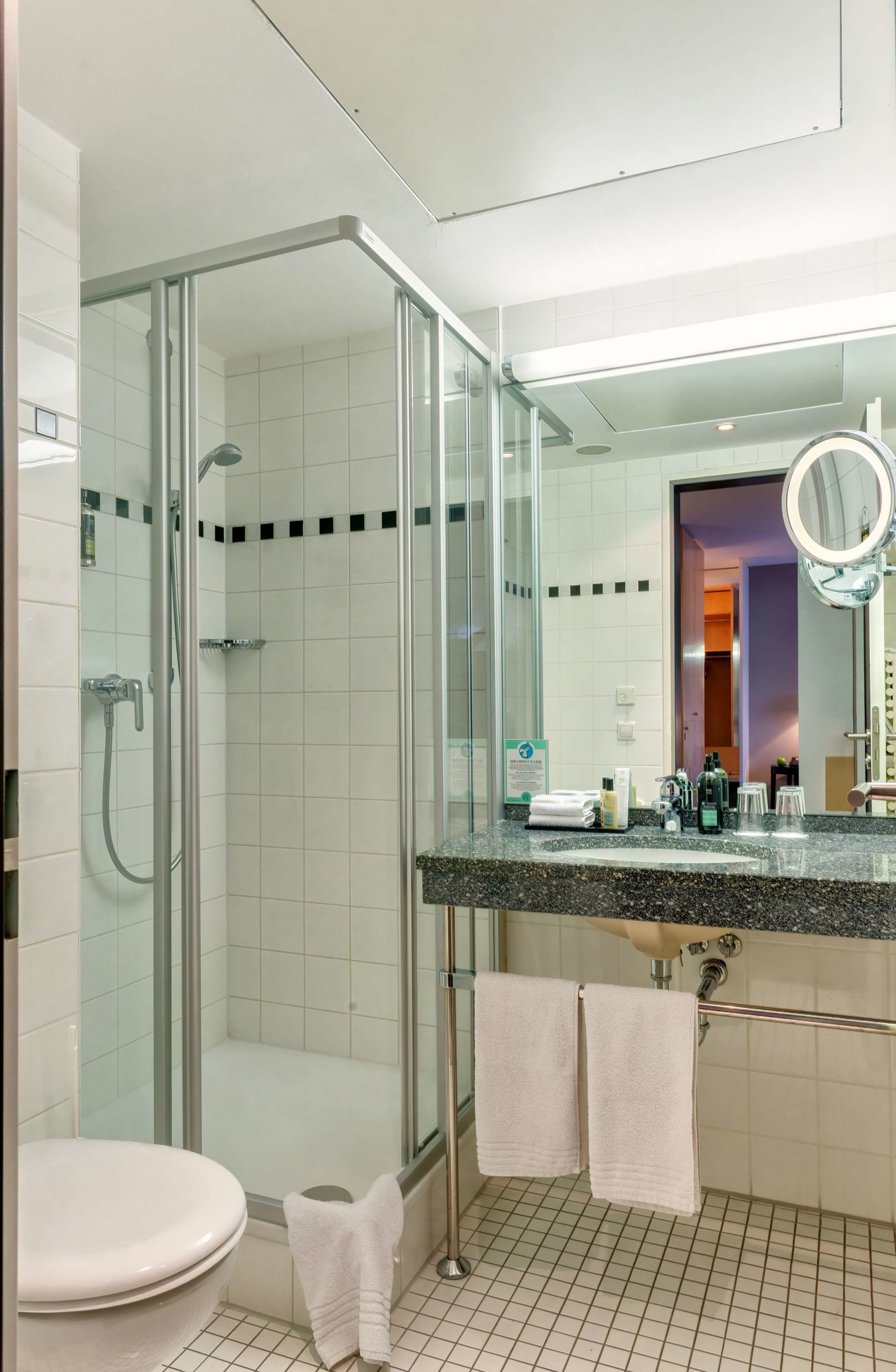 business single room | bathroom | eco-friendly toiletries, hair dryer, towels, soap