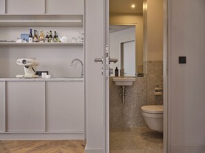 Suite | Bathroom | Eco-friendly toiletries, hair dryer, bathrobes, slippers