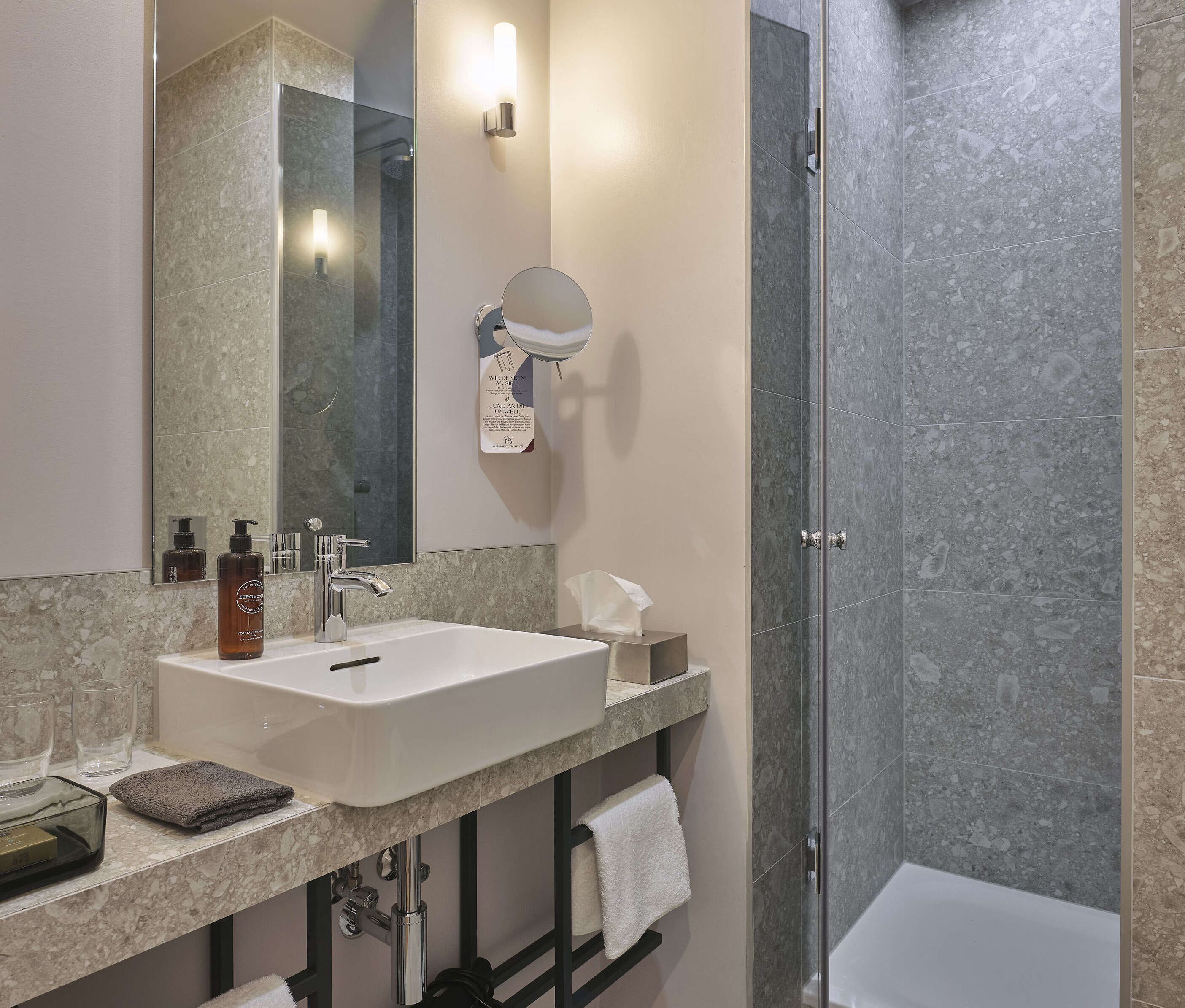 eco-friendly toiletries, hair dryer, bathrobes, slippers