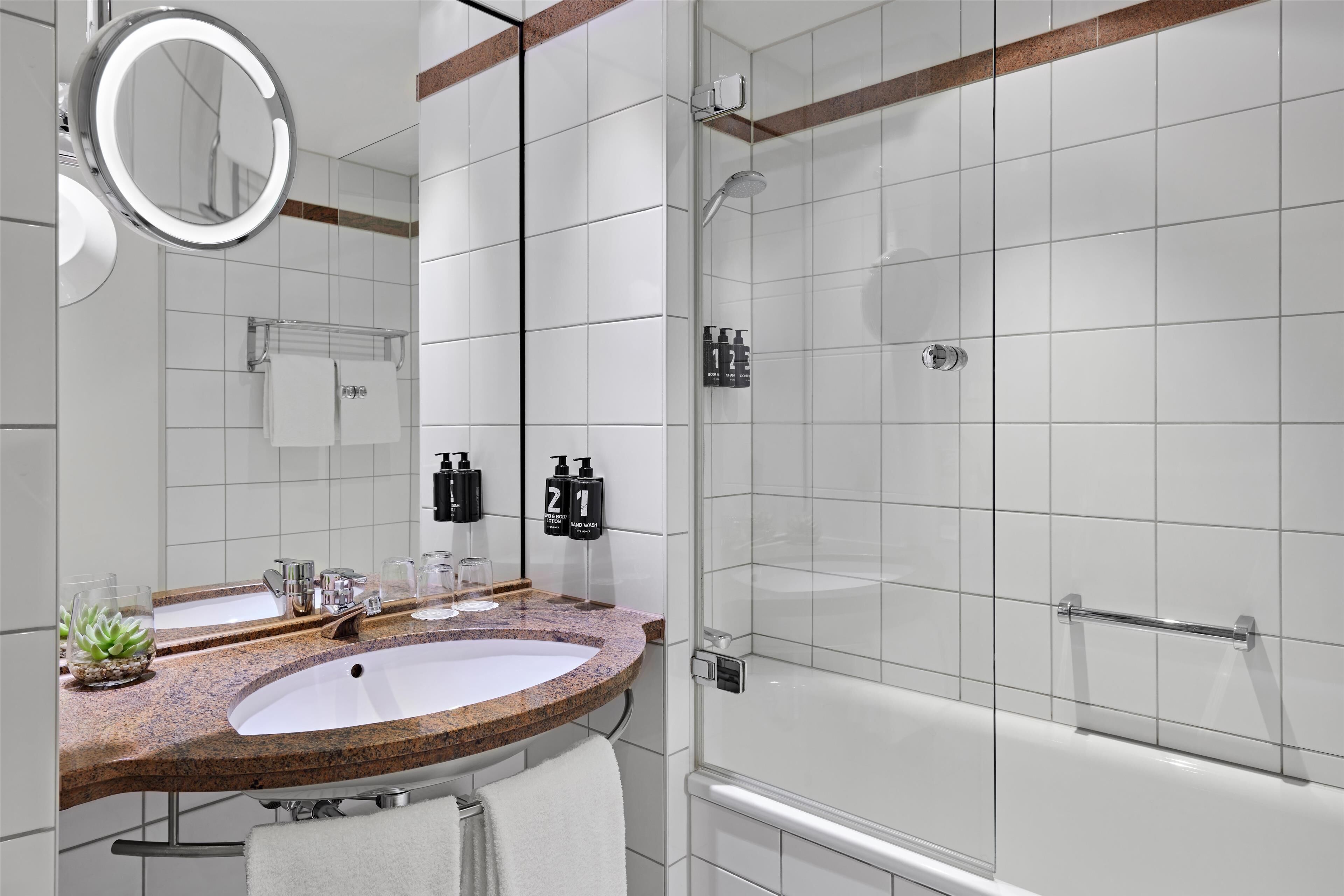 eco-friendly toiletries, hair dryer, bathrobes, towels