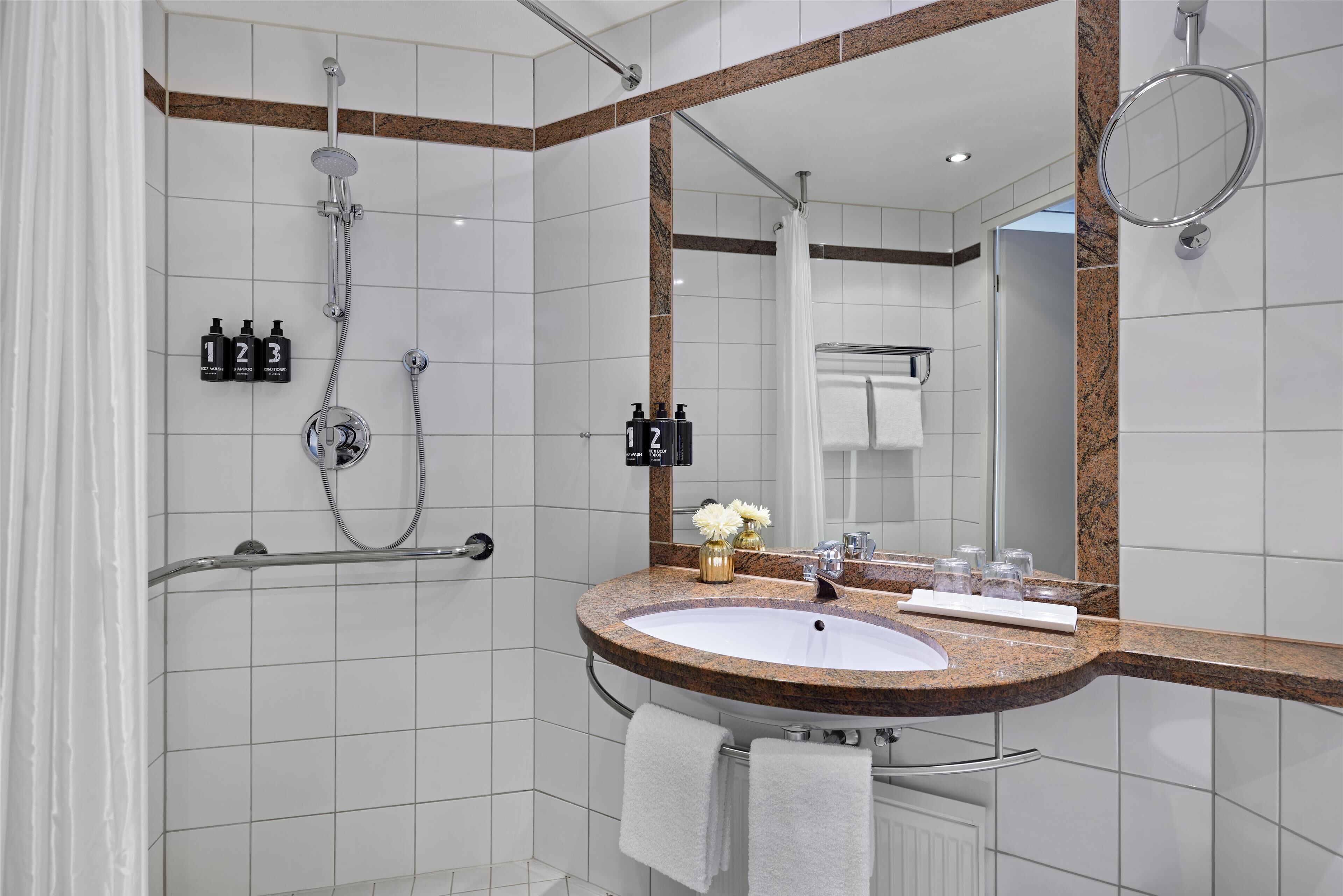 eco-friendly toiletries, hair dryer, bathrobes, towels