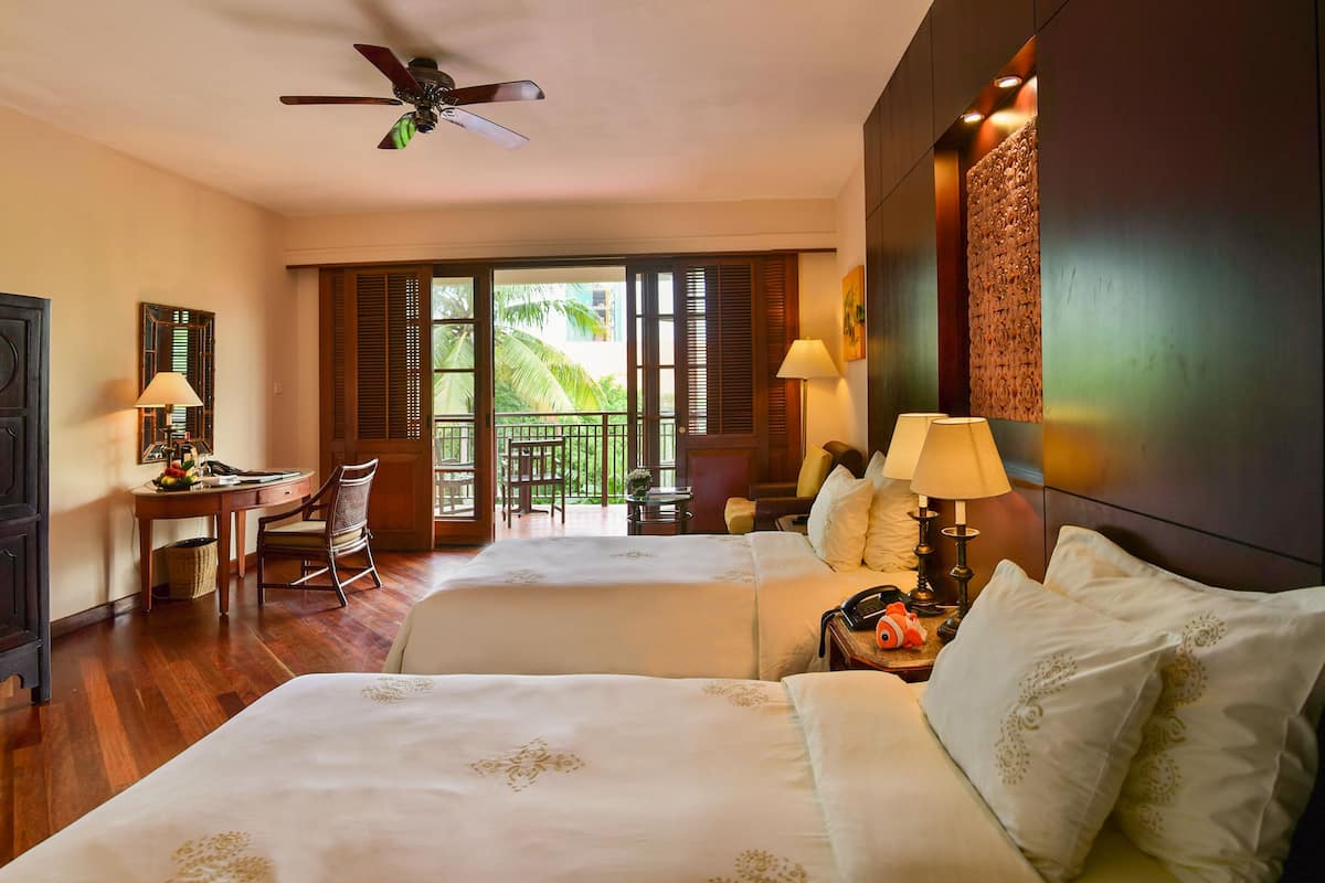 Quarto família, vista para o jardim | 1 quarto, roupas de cama premium, frigobar, cofres nos quartos