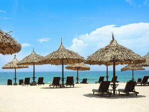 Private beach, white sand, sun-loungers, beach umbrellas
