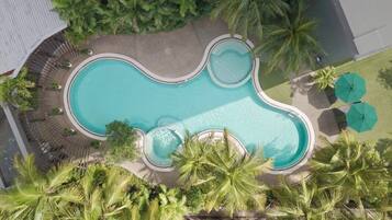 Outdoor pool, open 7:00 AM to 8:00 PM, pool loungers