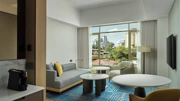 Executive Suite, 1 King Bed, City View | Living area | LCD TV