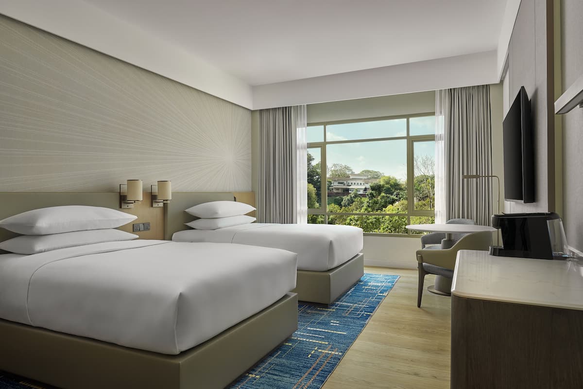 Deluxe Room, 2 Double Beds, City View | Premium bedding, in-room safe, individually decorated