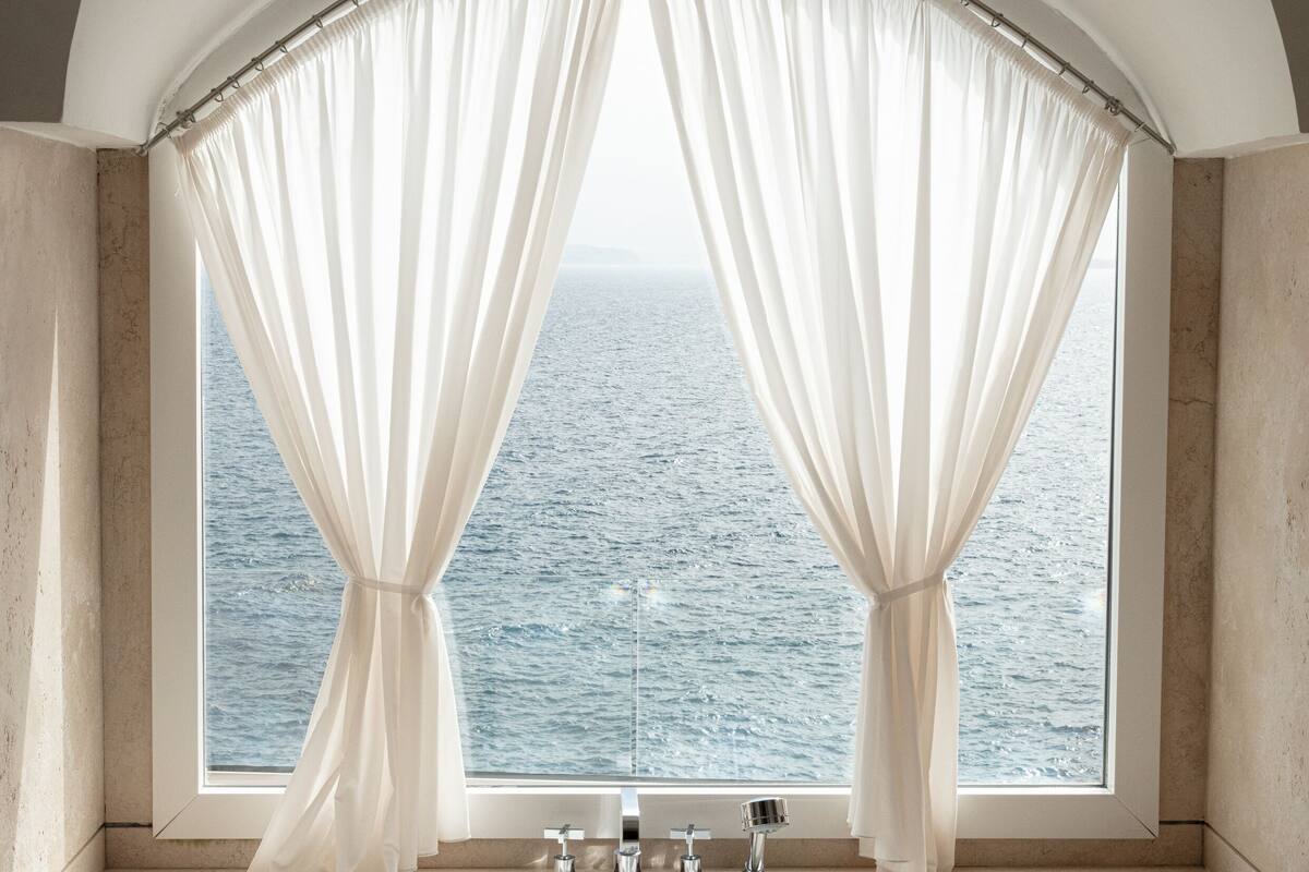 grand suite | bathroom | designer toiletries, hair dryer, bathrobes, slippers