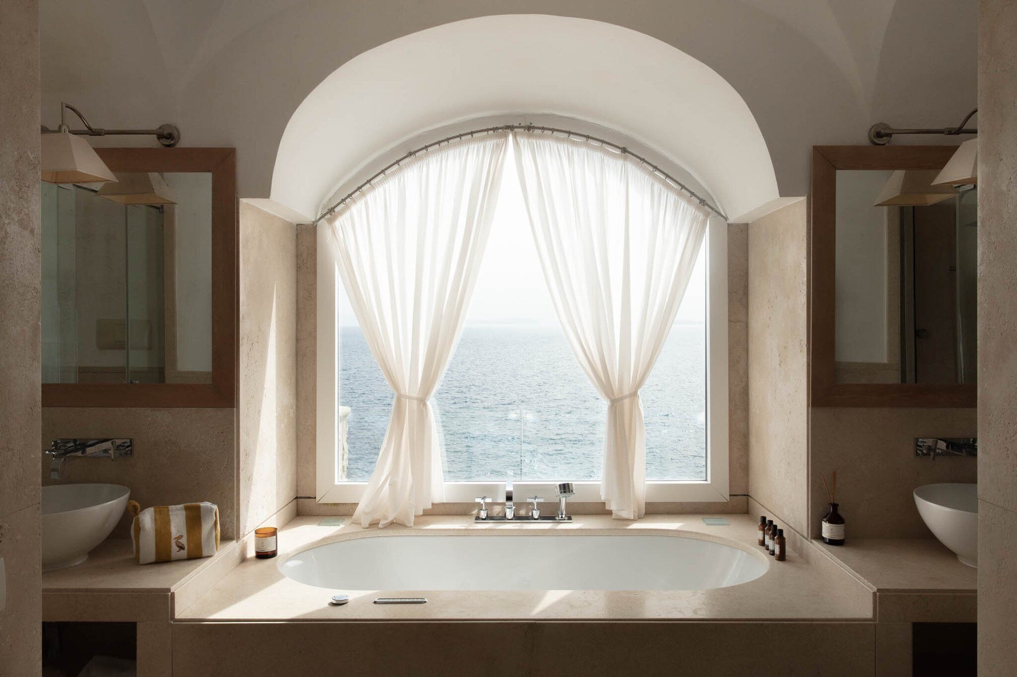 grand suite | bathroom | designer toiletries, hair dryer, bathrobes, slippers