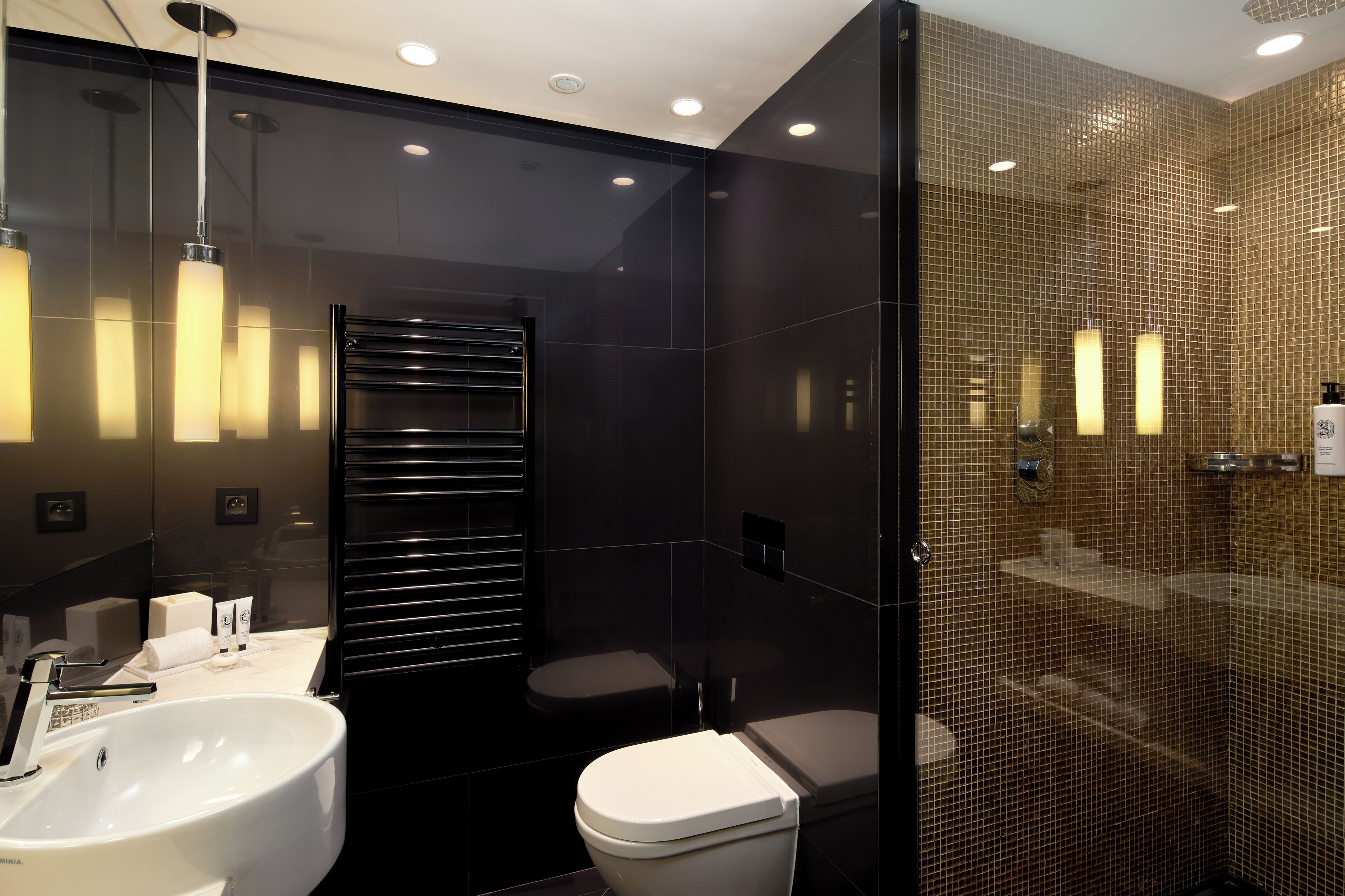 designer toiletries, hair dryer, bathrobes, slippers