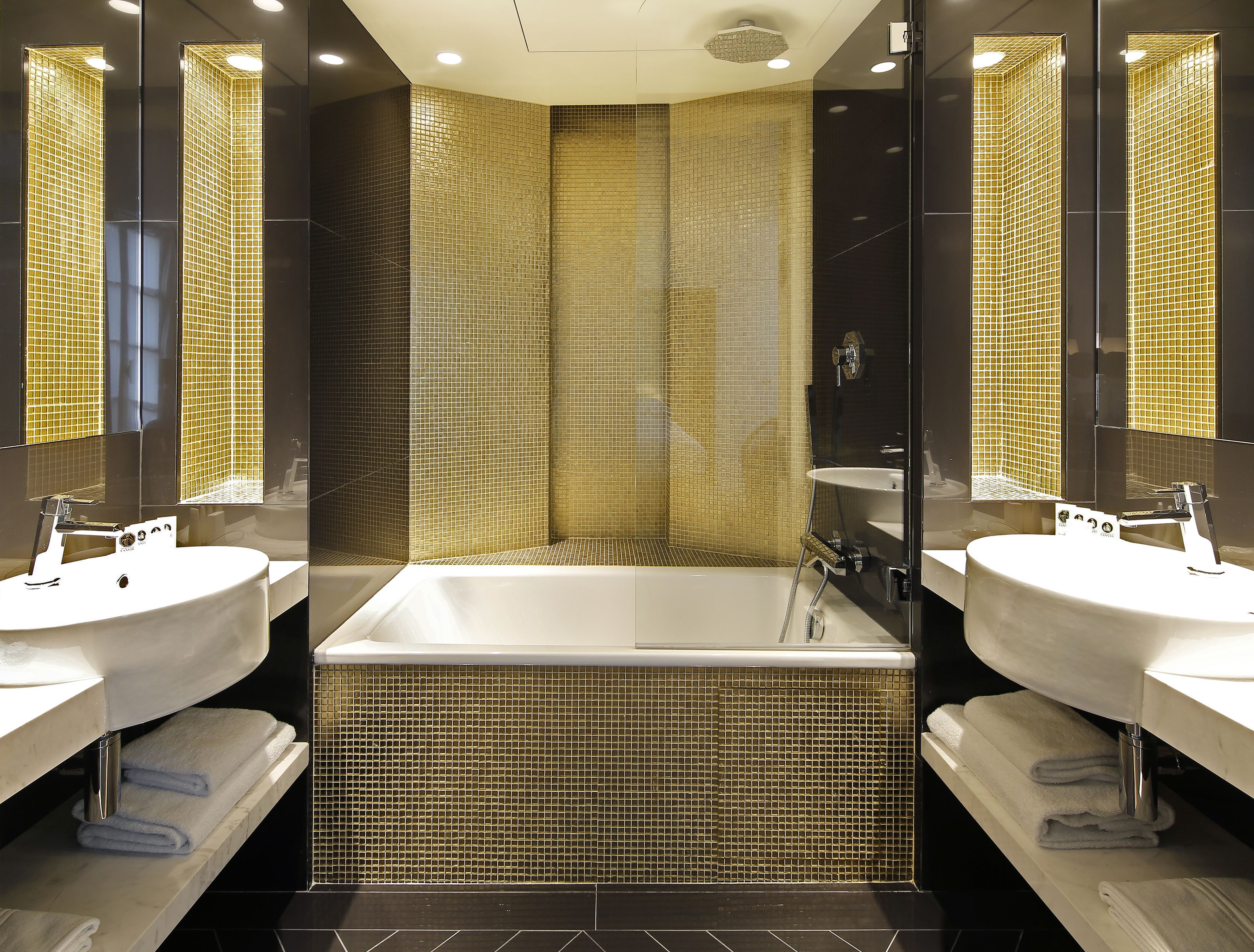 designer toiletries, hair dryer, bathrobes, slippers