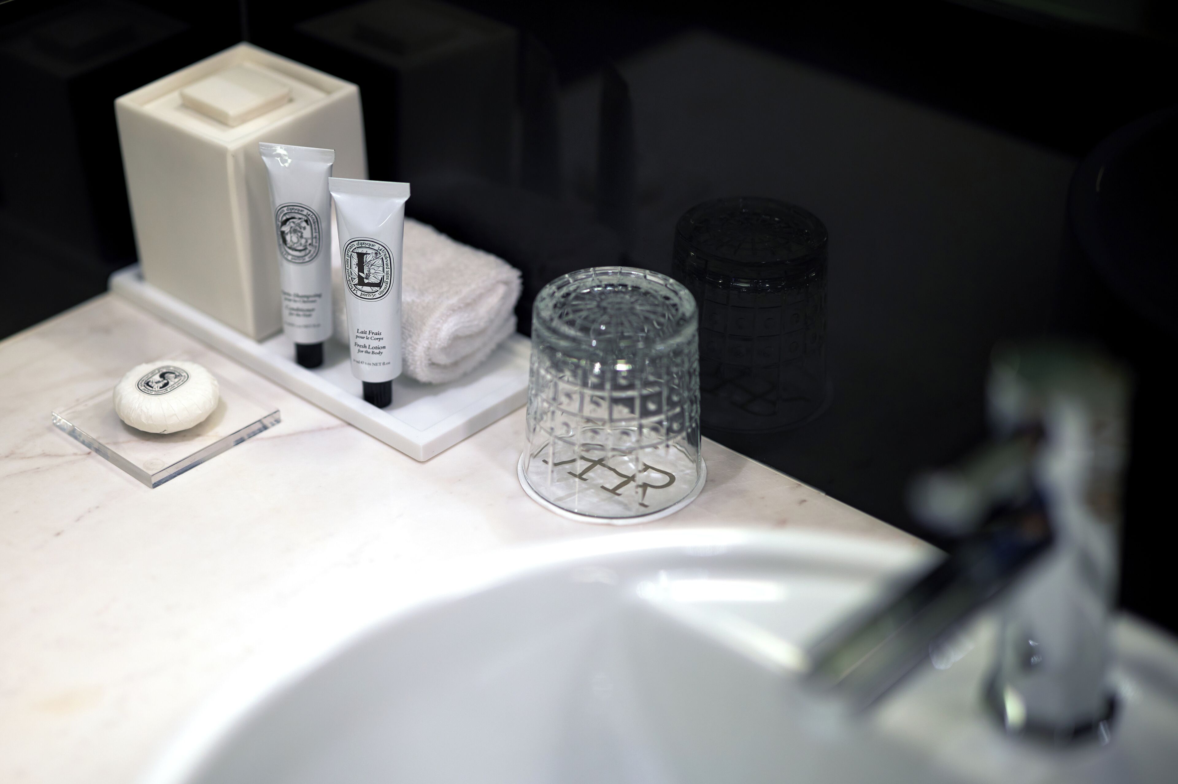 suite and balcony | bathroom | designer toiletries, hair dryer, bathrobes, slippers
