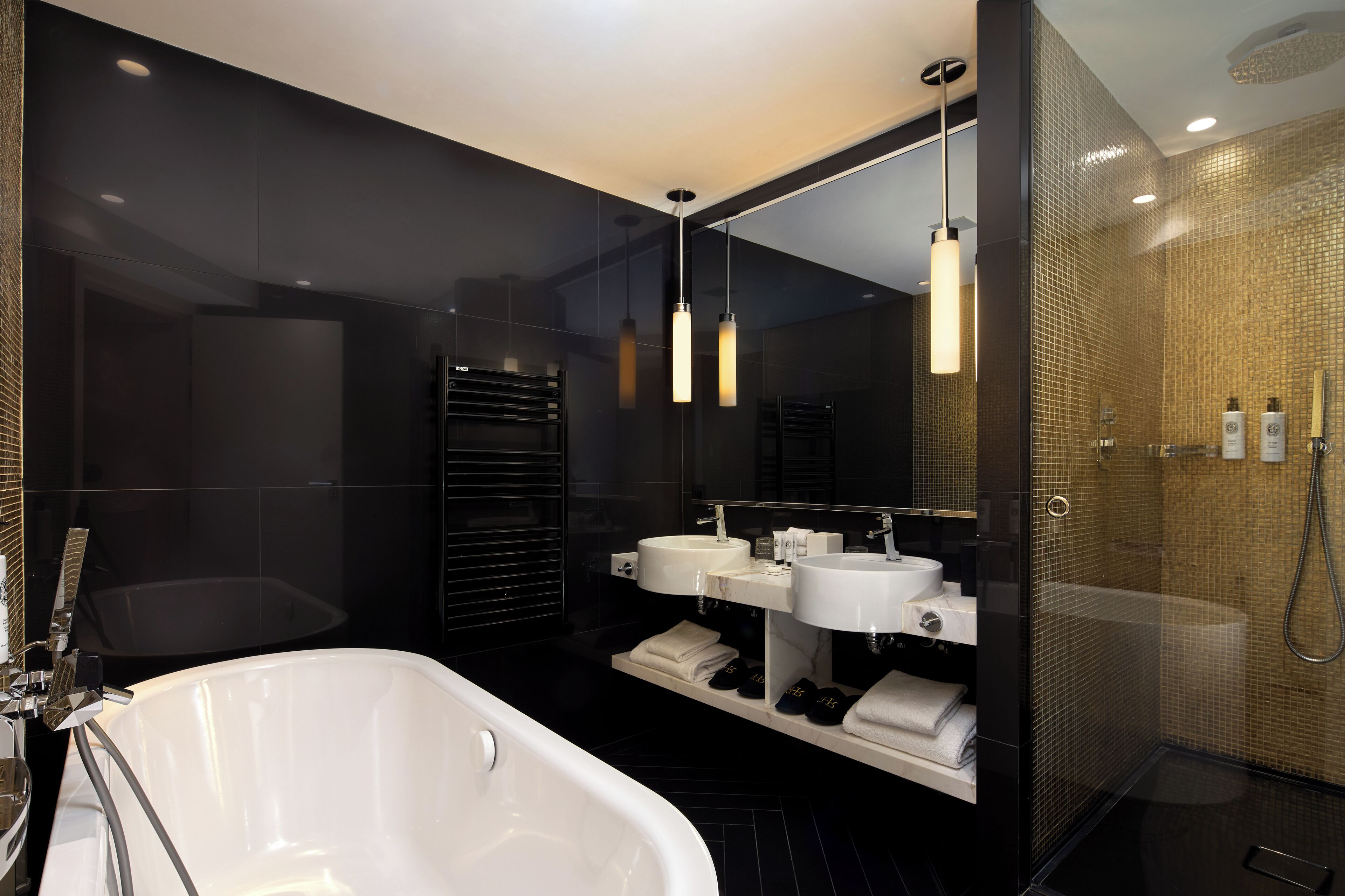 suite and balcony | bathroom | designer toiletries, hair dryer, bathrobes, slippers