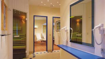Experience a stylish retreat with a large mirror, telephone, and modern amenities.