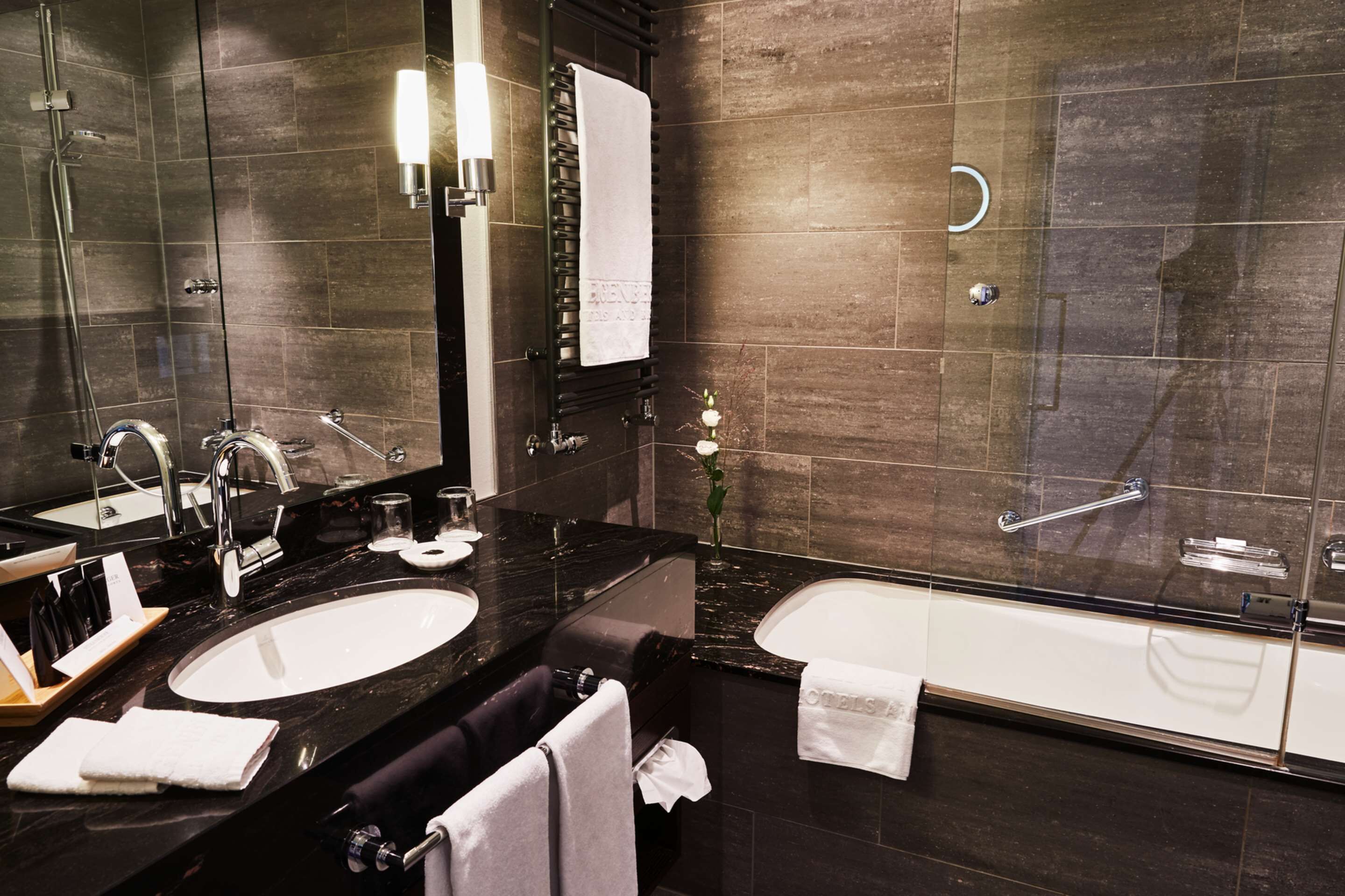 hair dryer, bathrobes, slippers, towels