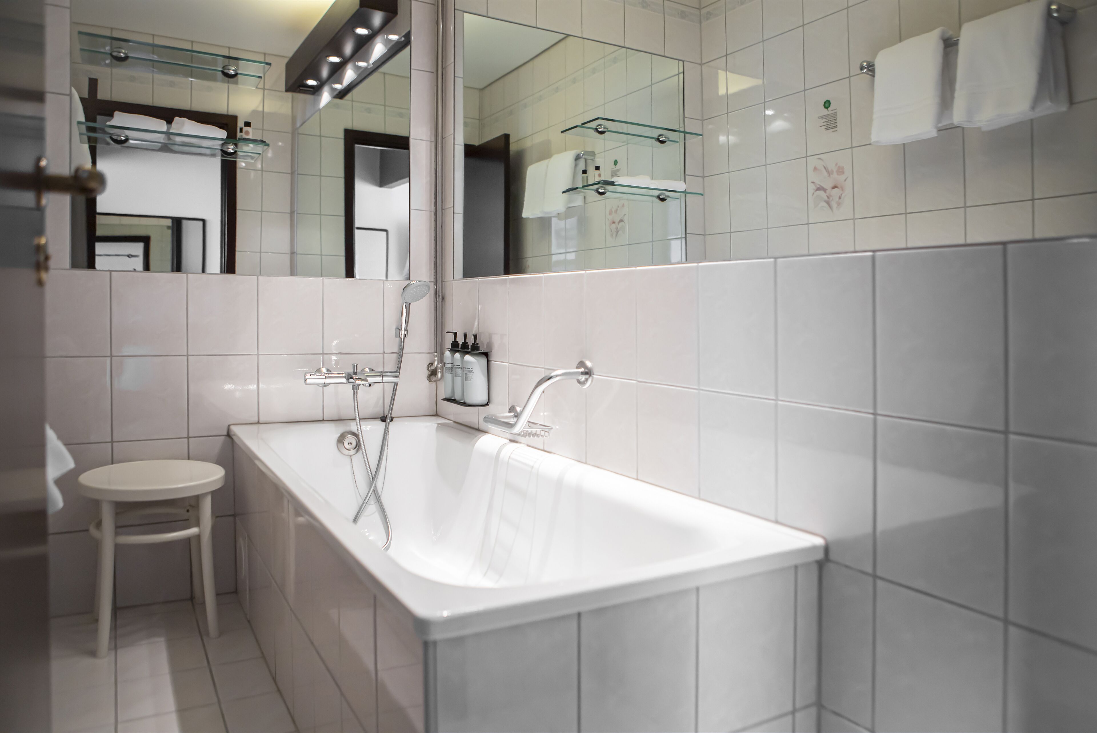 junior suite | bathroom | eco-friendly toiletries, hair dryer, bathrobes, towels
