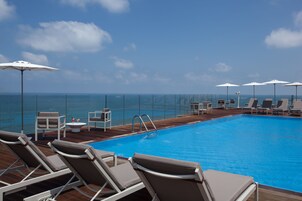 Outdoor pool, pool umbrellas, sun loungers