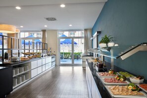 Daily buffet breakfast (EUR 18 per person)