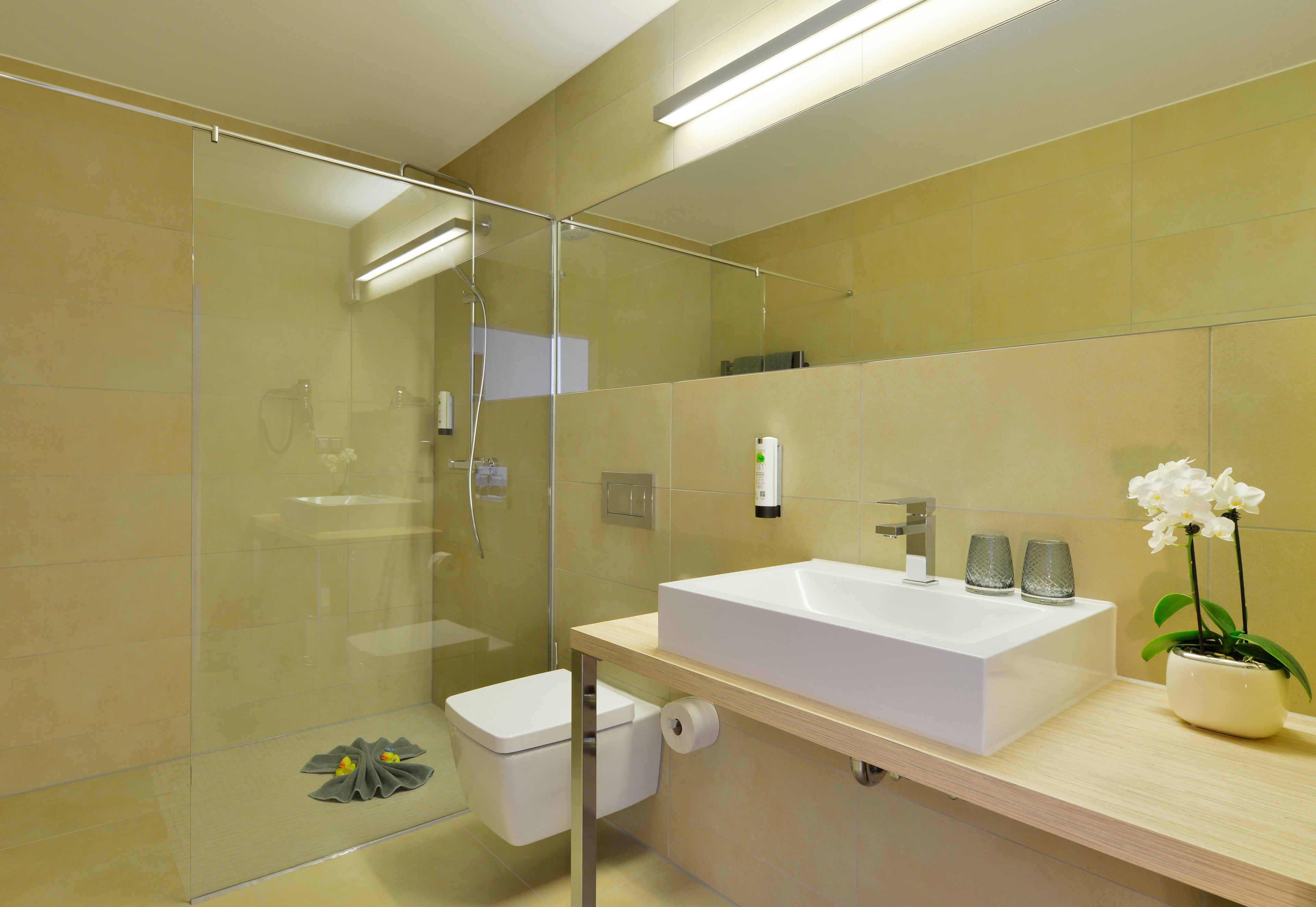 superior room | bathroom | shower, hair dryer, towels