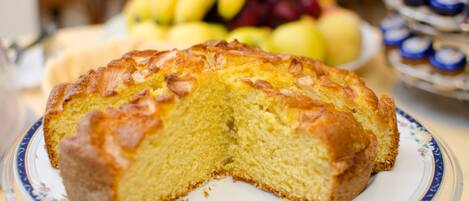 A slice of cake on a plate with a floral pattern.