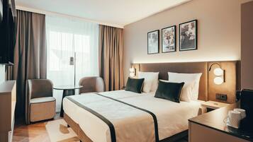 Habitación confort | Escritorio, sistema de insonorización, cunas gratuitas y wifi gratis