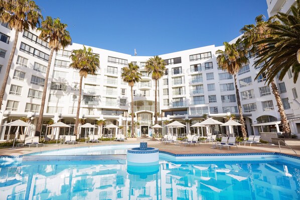 Outdoor pool, pool umbrellas, pool loungers